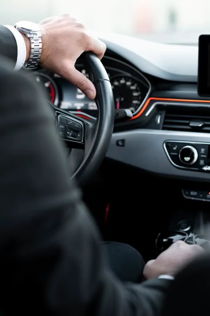 driver-dressed-elegant-costume - Limousine Service Houston Texas