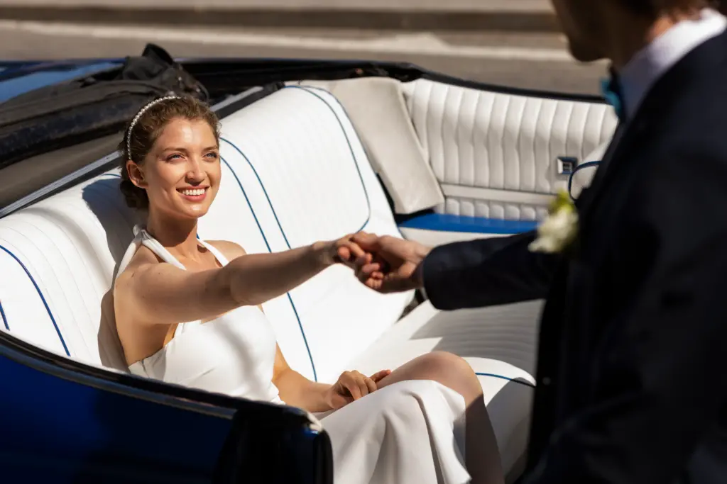 side-view-husband-wife-holding-hands- Limousine Service Houston Texas